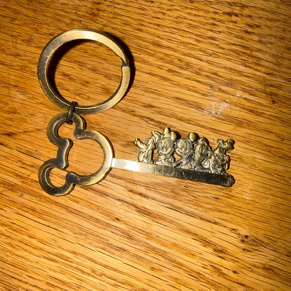 Vintage Disney Gold-tone Mickey Silhouette Keychain with Classic Character Bar